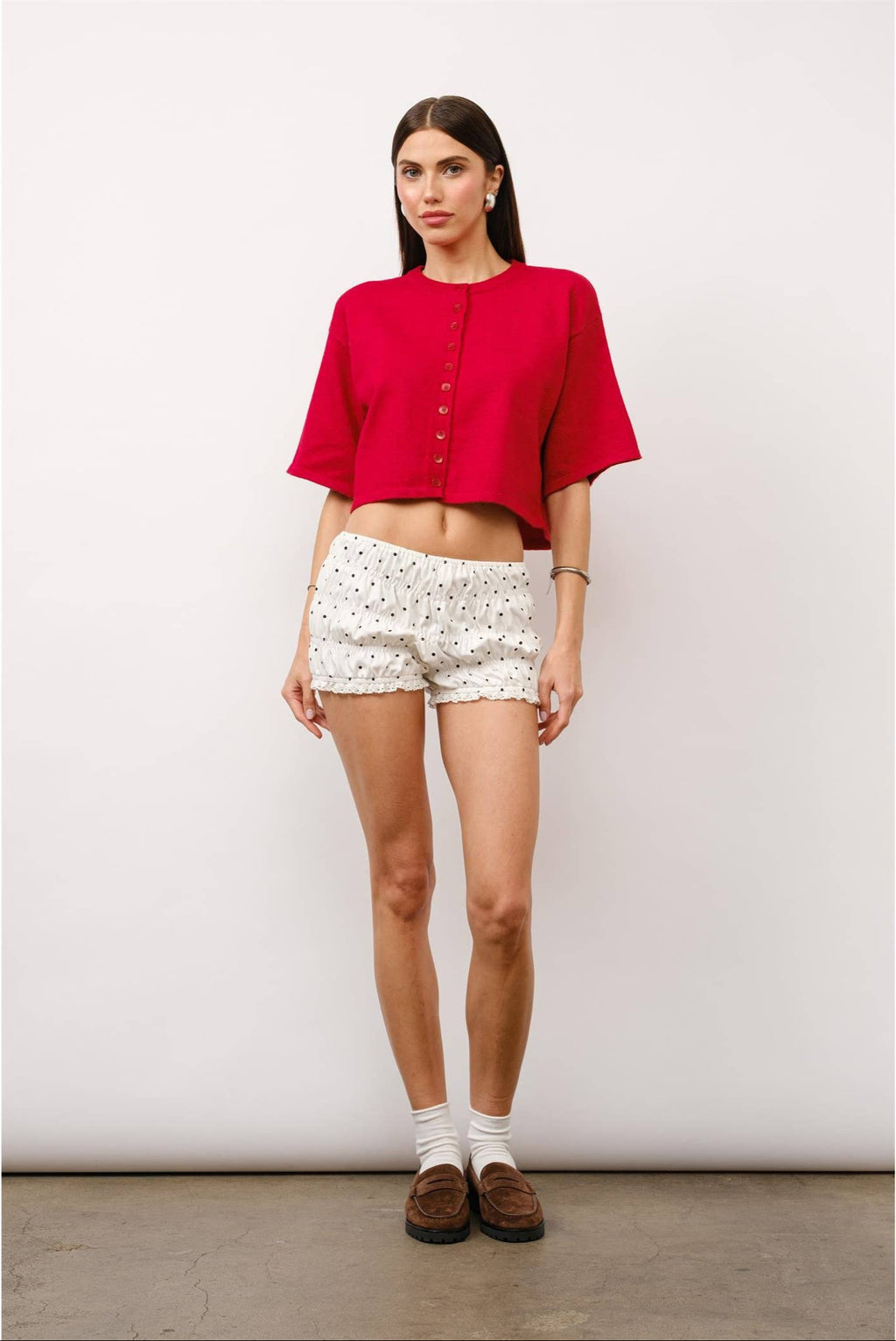 Willow short sleeve cardigan, cropped cardigan, boxy fit cardigan, elbow-length sleeve cardigan, center button cardigan, casual red cardigan, trendy layering piece, transitional wardrobe essential, modern cardigan for women, stylish knit top.