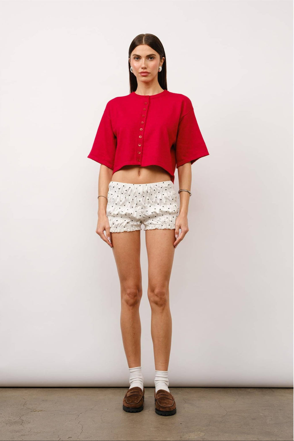 Willow short sleeve cardigan, cropped cardigan, boxy fit cardigan, elbow-length sleeve cardigan, center button cardigan, casual red cardigan, trendy layering piece, transitional wardrobe essential, modern cardigan for women, stylish knit top.