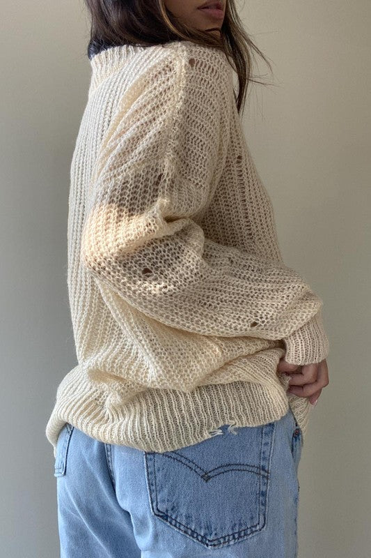 OVERSIZED KNIT SWEATER