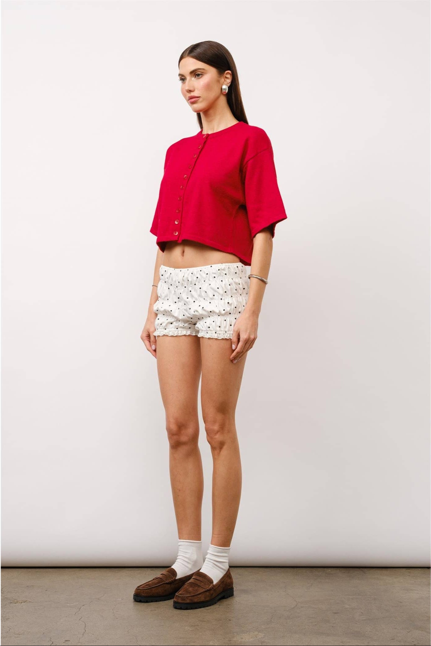 Willow short sleeve cardigan, cropped cardigan, boxy fit cardigan, elbow-length sleeve cardigan, center button cardigan, casual red cardigan, trendy layering piece, transitional wardrobe essential, modern cardigan for women, stylish knit top.
